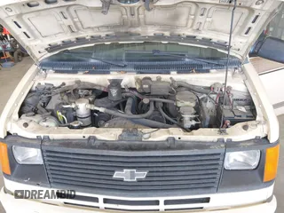 1991 Chevrolet Astro z VIN 1GCDM15Z8MB180051, wystawiony jako IAAI lot #42226795 z przebiegiem 163 024 mil mil oraz . Historia ofert i sprzedaży dostępna na DreamBid. Obrazek 10.