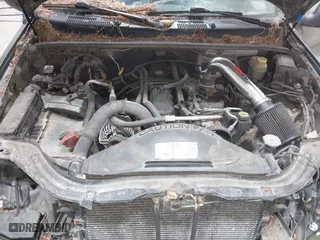 1999 Jeep Grand Cherokee Laredo with VIN 1J4GW58SXXC584734, listed as a IAAI auction lot 41902224 with 209,180 mi miles. Bid and sale history available at carsss.com. Image 10.