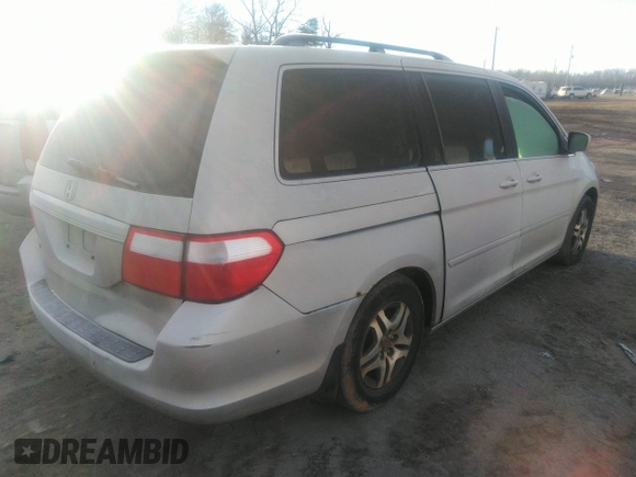 2006 Honda Odyssey EX-L with VIN 5FNRL38616B413712, listed as a IAAI auction lot 39878116 with 228,623 mi miles. Bid and sale history available at carsss.com. Image 4.