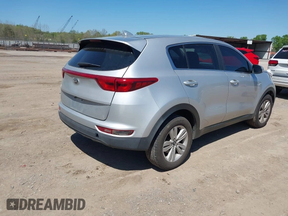 2017 Kia Sportage LX with VIN KNDPMCAC6H7292821, listed as a IAAI auction lot 41986248 with 67,772 mi miles and . Bid and sale history available at carsss.com. Image 4.