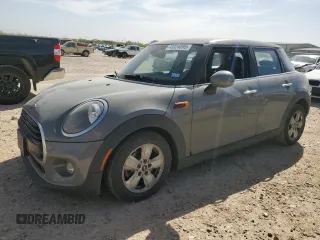 2019 MINI Hardtop 4 Door Cooper with VIN WMWXU1C57K2L09744, listed as a Copart auction lot 49324595 with 40,554 mi miles and Salvage Title. Bid and sale history available at DreamBid. Image 1.