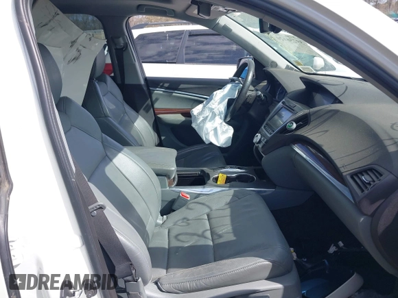 2016 Acura MDX w/Tech with VIN 5FRYD4H43GB014801, listed as a IAAI auction lot 39256120 with 73,769 mi miles. Bid and sale history available at carsss.com. Image 5.