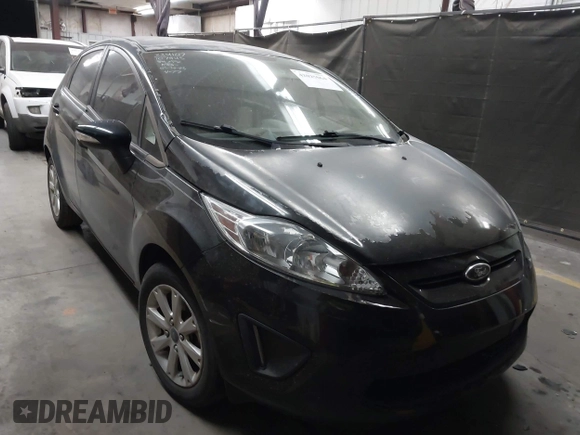 2013 Ford Fiesta SE with VIN 3FADP4EJ1DM107945, listed as a IAAI auction lot 42025064 with Not Provided miles and . Bid and sale history available at DreamBid. Image 1.