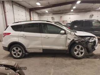 2016 Ford Escape SE with VIN 1FMCU9GX9GUC69153, listed as a IAAI auction lot 41504167 with 149,115 mi miles and . Bid and sale history available at DreamBid. Image 13.