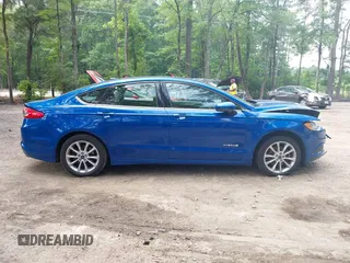 2017 Ford Fusion Hybrid SE with VIN 3FA6P0LU1HR162662, listed as a IAAI auction lot 42465793 with 116,414 mi miles and . Bid and sale history available at DreamBid. Image 13.