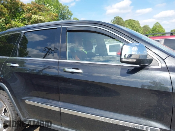 2013 Jeep Grand Cherokee Overland with VIN 1C4RJECT3DC526005, listed as a IAAI auction lot 42064151 with 112,777 mi miles and . Bid and sale history available at DreamBid. Image 13.