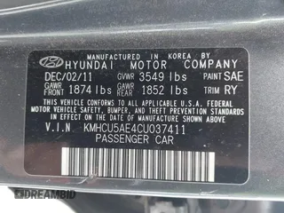 2012 Hyundai Accent SE with VIN KMHCU5AE4CU037411, listed as a IAAI auction lot 41659662 with 163,021 mi miles. Bid and sale history available at carsss.com. Image 9.
