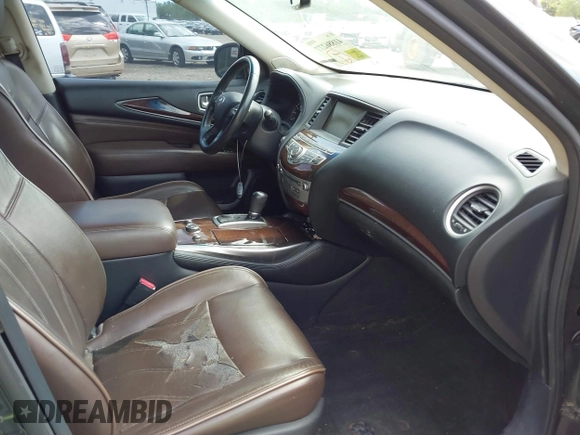 2013 Infiniti JX35 with VIN 5N1AL0MN8DC301195, listed as a IAAI auction lot 41886277 with 189,743 mi miles and . Bid and sale history available at DreamBid. Image 5.