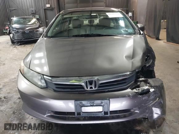 2012 Honda Civic LX z VIN 19XFB2F59CE373830, wystawiony jako IAAI lot #42312118 z przebiegiem 106 541 mil mil oraz . Historia ofert i sprzedaży dostępna na DreamBid. Obrazek 12.
