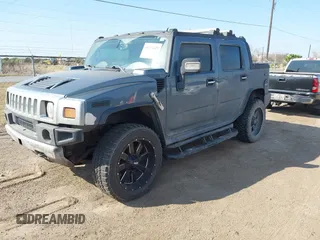2006 Hummer H2 with VIN 5GRGN22U06H103326, listed as a IAAI auction lot 41474829 with 217,436 mi miles. Bid and sale history available at carsss.com. Image 17.