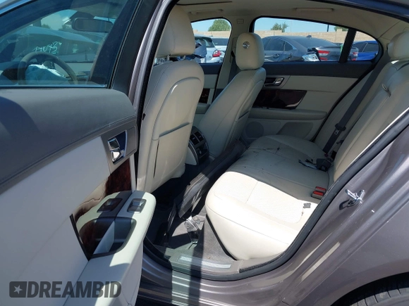 2010 Jaguar XF Premium Luxury with VIN SAJWA0GB6ALR77790, listed as a IAAI auction lot 41987113 with 69,094 mi miles. Bid and sale history available at carsss.com. Image 8.