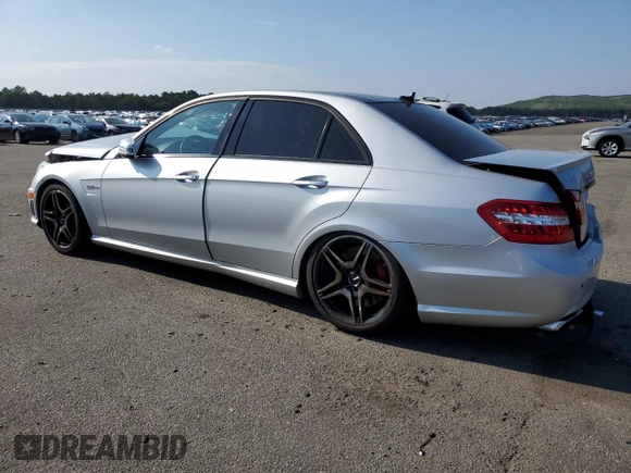 2010 Mercedes-Benz E 63 AMG with VIN WDDHF7HBXAA149436, listed as a Copart auction lot 68736984 with 112,176 mi miles and Salvage title. Bid and sale history available at DreamBid. Image 2.