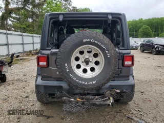 2019 Jeep Wrangler Sport S с VIN 1C4GJXAG1KW579094, выставлен на аукционе Copart как лот 55410525 с пробегом 53 915 миль миль и Списание • Salvage title. История ставок и продаж доступна на DreamBid. Изображение 6.