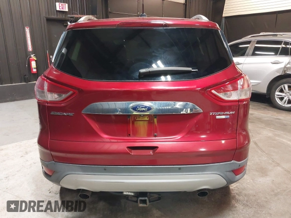 2014 Ford Escape Titanium with VIN 1FMCU9J9XEUD69589, listed as a IAAI auction lot 42031882 with 123,632 mi miles and . Bid and sale history available at DreamBid. Image 16.