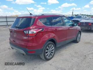 2018 Ford Escape Titanium with VIN 1FMCU0J96JUD58854, listed as a IAAI auction lot 42590609 with 77,825 mi miles and . Bid and sale history available at DreamBid. Image 4.