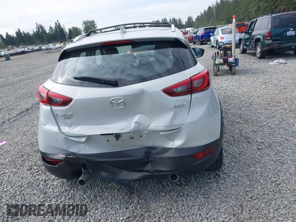 2017 Mazda CX-3 Grand Touring z VIN JM1DKFD70H0159621, wystawiony jako IAAI lot #42331482 z przebiegiem 55 166 mil mil oraz . Historia ofert i sprzedaży dostępna na DreamBid. Obrazek 16.