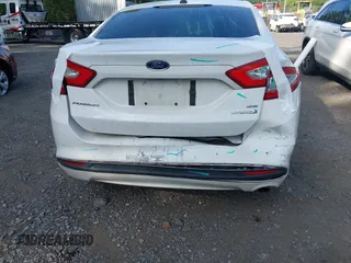 2013 Ford Fusion SE Hybrid with VIN 3FA6P0LUXDR349019, listed as a IAAI auction lot 42800125 with 143,089 mi miles and . Bid and sale history available at DreamBid. Image 6.