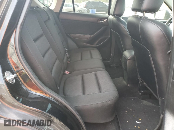 2014 Mazda CX-5 Touring with VIN JM3KE2CY9E0375990, listed as a Copart auction lot 50875165 with 166,574 mi miles and Salvage Title. Bid and sale history available at carsss.com. Image 11.