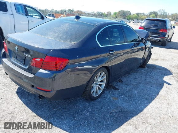 2014 BMW 5 Series 535i with VIN WBA5B1C54ED477525, listed as a IAAI auction lot 41692887 with 122,288 mi miles. Bid and sale history available at carsss.com. Image 4.
