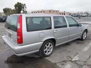 1998 Volvo V70 GLT with VIN YV1LW5678W2507748, listed as a IAAI auction lot 41911506 with 214,463 mi miles. Bid and sale history available at carsss.com. Image 4.