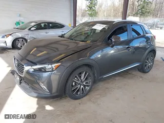 2017 Mazda CX-3 Grand Touring with VIN JM1DKFD70H0150496, listed as a IAAI auction lot 41746038 with 108,091 mi miles. Bid and sale history available at carsss.com. Image 18.