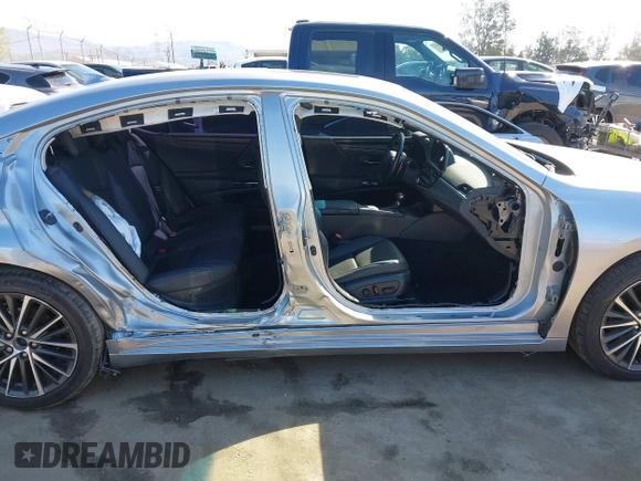 2022 Lexus ES 300h with VIN 58ADA1C15NU026087, listed as a IAAI auction lot 41765304 with 20,795 mi miles and . Bid and sale history available at DreamBid. Image 14.