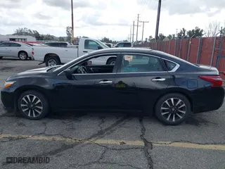 2018 Nissan Altima 2.5 SL with VIN 1N4AL3AP1JC198487, listed as a IAAI auction lot 41583866 with 146,172 mi miles. Bid and sale history available at carsss.com. Image 14.