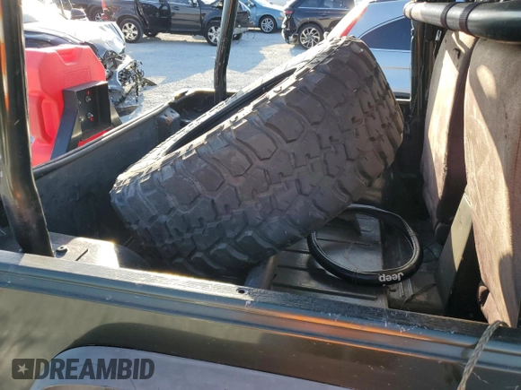 1997 Jeep Wrangler Sport with VIN 1J4FY19S0VP453959, listed as a Copart auction lot 44560295 with 182,464 mi miles and Salvage Title. Bid and sale history available at carsss.com. Image 11.