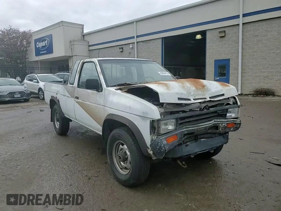 1988 Nissan Hardbody E z VIN 1N6ND16Y3JC351348, wystawiony jako Copart lot #80864914 z przebiegiem 184 397 mil mil oraz Szkody całkowita. Historia ofert i sprzedaży dostępna na DreamBid. Obrazek 11.