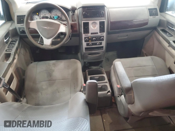 2010 Chrysler Town & Country LX with VIN 2A4RR4DE6AR198174, listed as a Copart auction lot 50757005 with 211,130 mi miles and Salvage Title. Bid and sale history available at DreamBid. Image 8.