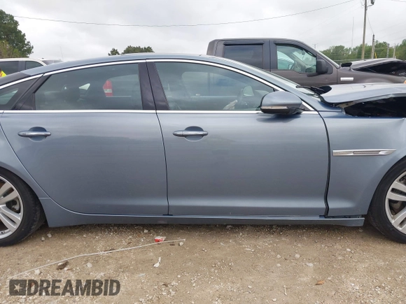 2013 Jaguar XJ with VIN SAJWA2G17DLV57561, listed as a IAAI auction lot 41928575 with 108,794 mi miles. Bid and sale history available at carsss.com. Image 14.