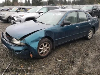 1997 Nissan Altima XE with VIN 1N4BU31D3VC222205, listed as a Copart auction lot 84018274 with 261,349 mi miles and Salvage Title. Bid and sale history available at carsss.com. Image 1.