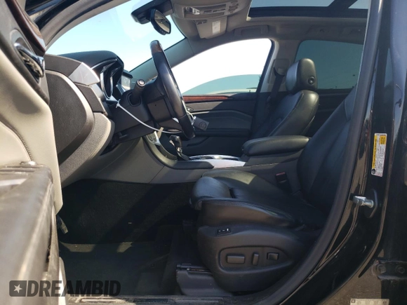 2011 Cadillac SRX Premium Collection with VIN 3GYFNFEYXBS547540, listed as a Copart auction lot 62563895 with 107,136 mi miles and Salvage title. Bid and sale history available at DreamBid. Image 7.