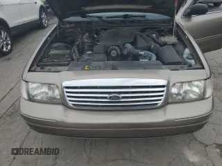 2005 Ford Crown Victoria LX z VIN 2FAFP74W95X147431, wystawiony jako Copart lot #73487374 z przebiegiem 203 107 mil mil oraz Nie do naprawy • Non repairable. Historia ofert i sprzedaży dostępna na DreamBid. Obrazek 11.