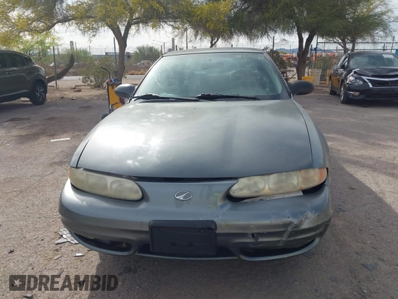 2004 Oldsmobile Alero GL1 z VIN 1G3NL52F84C124744, wystawiony jako IAAI lot #41916407 z przebiegiem 164 660 mil mil oraz . Historia ofert i sprzedaży dostępna na DreamBid. Obrazek 12.