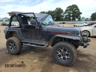 2005 Jeep Wrangler Rubicon with VIN 1J4FA69S75P340544, listed as a Copart auction lot 73085774 with 104,046 mi miles and Salvage Title. Bid and sale history available at carsss.com. Image 4.