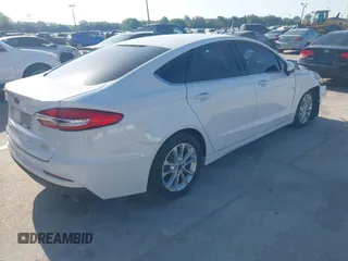 2019 Ford Fusion SE with VIN 3FA6P0HD1KR217840, listed as a IAAI auction lot 42011309 with 85,945 mi miles and . Bid and sale history available at carsss.com. Image 4.