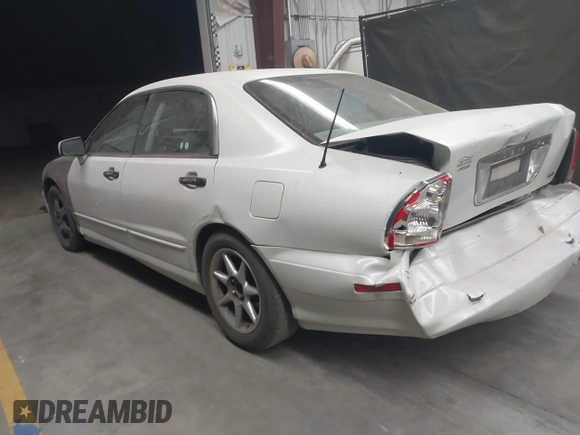 2003 Mitsubishi Diamante LS z VIN 6MMAP67P13T012396, wystawiony jako IAAI lot #40668729 z przebiegiem 157 250 mil mil oraz . Historia ofert i sprzedaży dostępna na DreamBid. Obrazek 3.