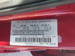 2014 Mazda 3 i Touring with VIN JM1BM1V77E1131727, listed as a IAAI auction lot 41891337 with 287,797 mi miles and . Bid and sale history available at DreamBid. Image 9.