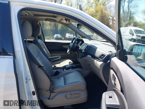 2016 Honda Pilot Touring with VIN 5FNYF6H9XGB005516, listed as a IAAI auction lot 41975049 with 85,217 mi miles. Bid and sale history available at carsss.com. Image 5.