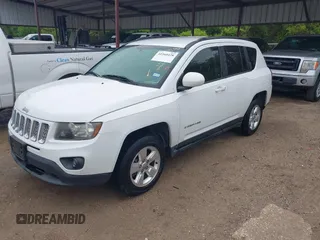 2014 Jeep Compass High Altitude with VIN 1C4NJCEAXED715454, listed as a IAAI auction lot 41960428 with 117,023 mi miles. Bid and sale history available at carsss.com. Image 2.