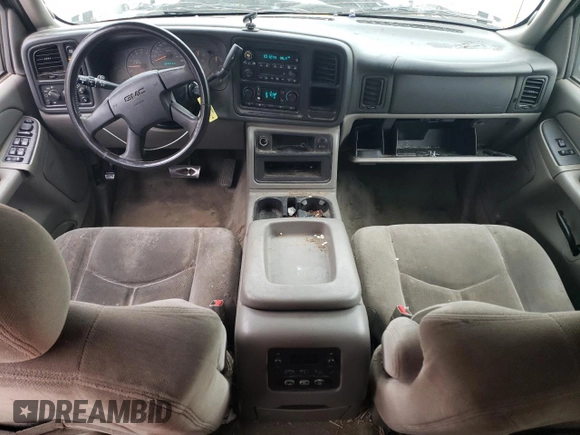 2004 GMC Yukon SLE with VIN 1GKEK13V14J136414, listed as a Copart auction lot 77021464 with 262,143 mi miles and Salvage Title. Bid and sale history available at carsss.com. Image 8.