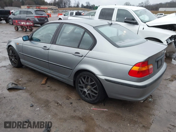 2005 BMW 3 Series 325i with VIN WBAEV33445KX10986, listed as a IAAI auction lot 41560642 with 176,386 mi miles. Bid and sale history available at carsss.com. Image 3.
