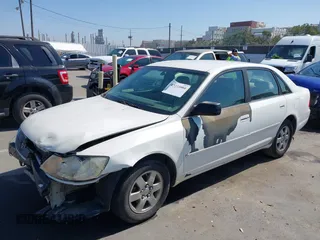 2001 Toyota Avalon XL z VIN 4T1BF28B51U139054, wystawiony jako IAAI lot #42223994 z przebiegiem 250 902 mil mil oraz . Historia ofert i sprzedaży dostępna na DreamBid. Obrazek 4.