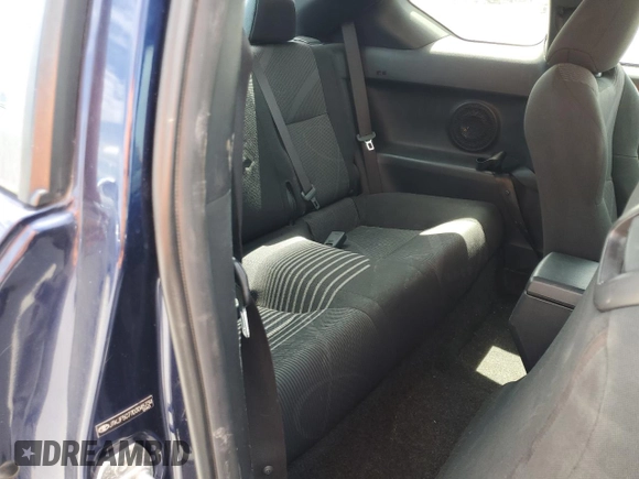 2013 Scion tC z VIN JTKJF5C77D3045734, wystawiony jako Copart lot #55356405 z przebiegiem 174 691 mil mil oraz Szkody całkowita. Historia ofert i sprzedaży dostępna na DreamBid. Obrazek 10.