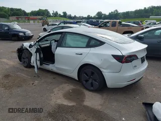 2023 Tesla Model 3 with VIN 5YJ3E1EA4PF644621, listed as a IAAI auction lot 42280312 with 41,262 mi miles and . Bid and sale history available at DreamBid. Image 3.
