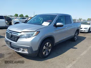 2019 Honda Ridgeline RTL-E with VIN 5FPYK3F79KB029771, listed as a IAAI auction lot 42448369 with 90,142 mi miles and . Bid and sale history available at DreamBid. Image 17.