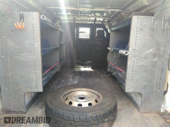 2010 Ford Econoline Cargo Commercial with VIN 1FTNE2EW0ADA98103, listed as a IAAI auction lot 41735290 with 143,717 mi miles and . Bid and sale history available at DreamBid. Image 8.