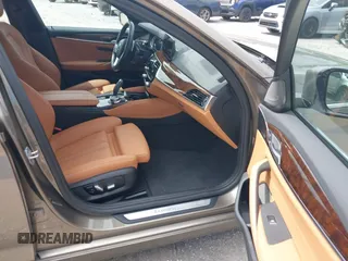 2018 BMW 5 Series 530i xDrive with VIN WBAJA7C55JG909519, listed as a IAAI auction lot 42650263 with 57,077 mi miles and . Bid and sale history available at DreamBid. Image 5.