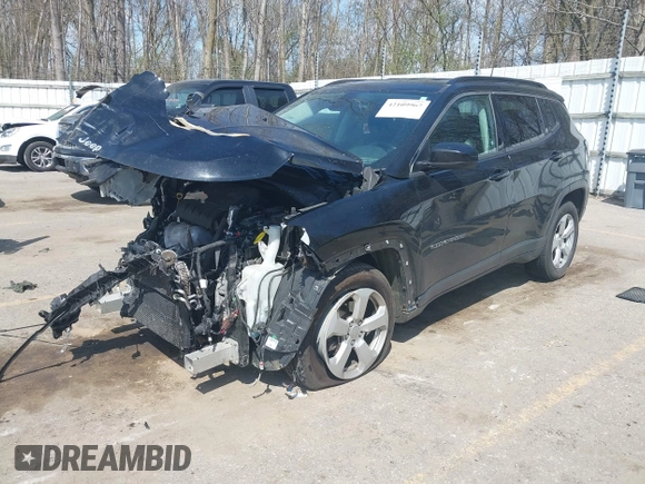 2018 Jeep Compass Latitude with VIN 3C4NJDBB1JT265894, listed as a IAAI auction lot 42109967 with 92,944 mi miles and . Bid and sale history available at DreamBid. Image 2.